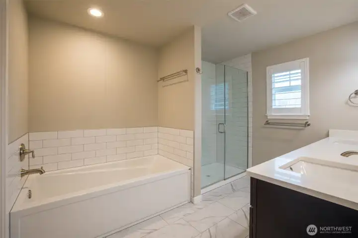 Why yes, sink into that tub just made for a good soak.