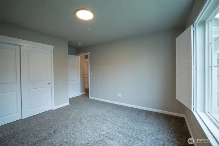 - double closet and noticed the room darkening shutters carry through all the rooms.