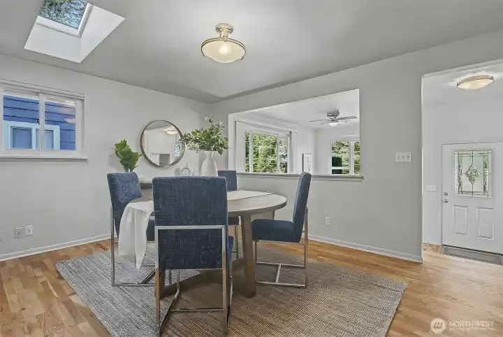 Huge dining room with skylight for added light.