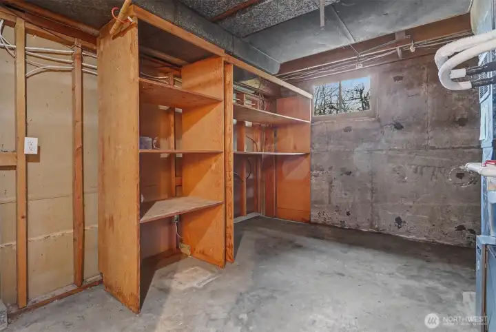 The utility room on the lower level has tons of storage space.