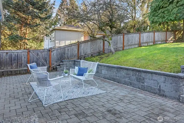 The fully-fenced backyard has an awesome patio which is perfect for entertaining and grilling.