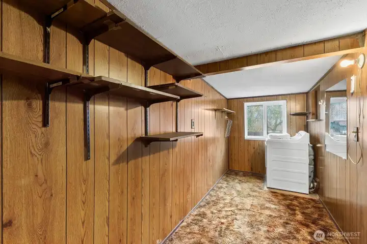 The laundry room is surprisingly long and has plenty of space for storage, your pantry, etc.