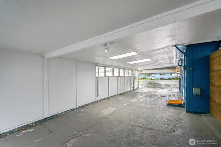 Check out the carport! This covered space can fit 2-3 cars.