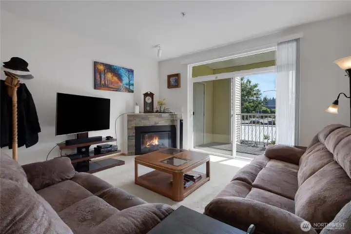 Inside living room with patio/deck off slider area