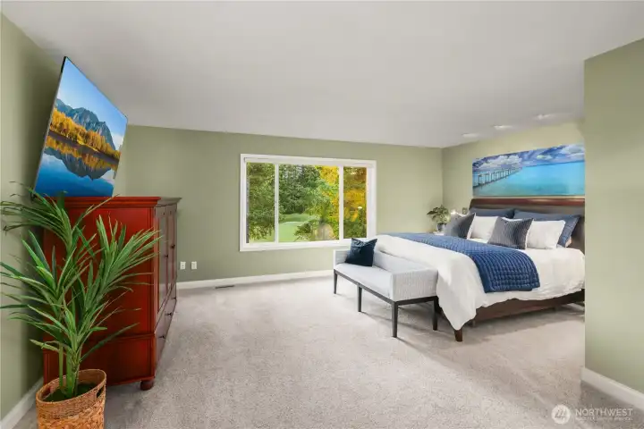 Steal away upstairs to your expansive primary suite looking out toward the golf course.