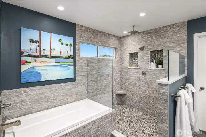 5-piece en-suite primary bath with heated floors, walk-in shower, & separate soaking tub.