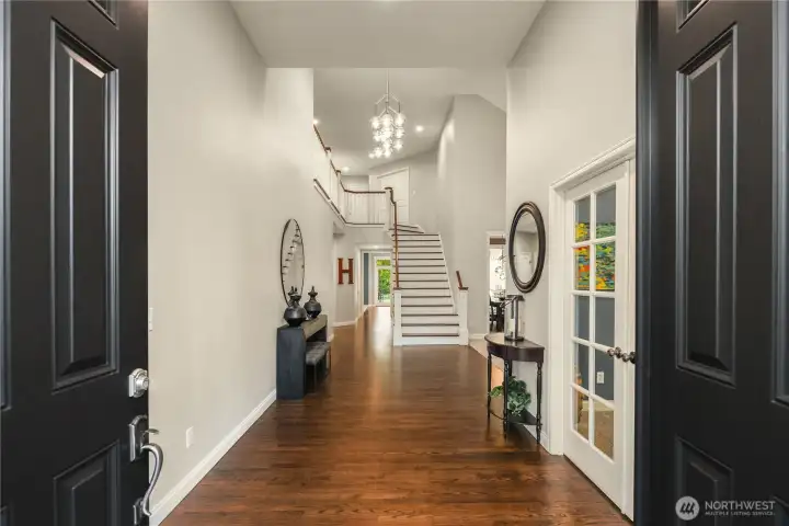 A double-door entry leads to the soaring foyer.