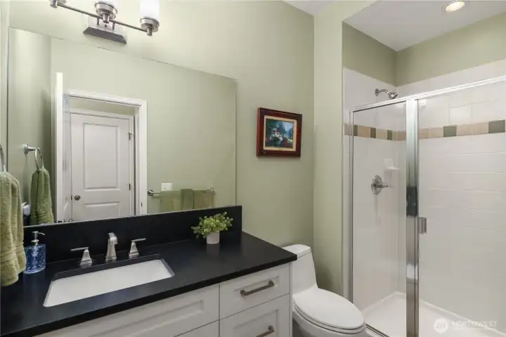 En-suite bathroom in the main floor bedroom.