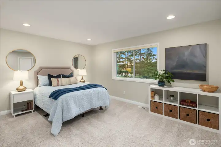 Second upstairs bedroom, also generously sized.