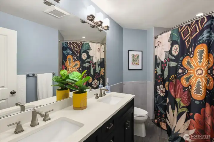 Full bathroom off the upstairs hallway.