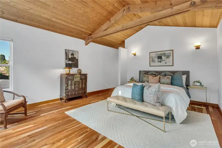 Primary Bedroom with High Vaulted Ceilings and Year Round Sound Views Primary Bedroom with High Vaulted Ceilings and Year Round Sound Views