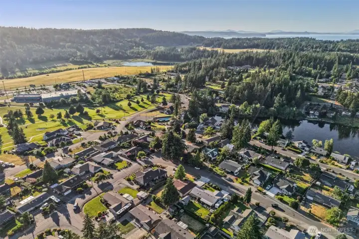 Northwest view of Camaloch Golf Course, Smith Lake and Skagit Bay.
