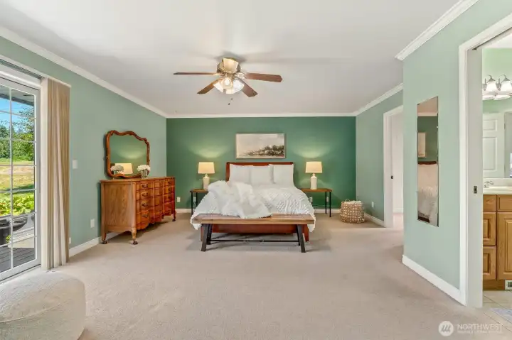 Primary bedroom, door to bath on right.