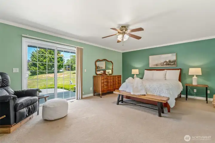 Primary bedroom with door to deck