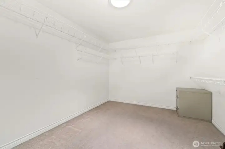 Primary walk-in closet with safe.