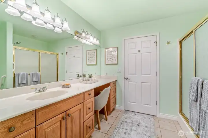 Primary bath with door to utility room