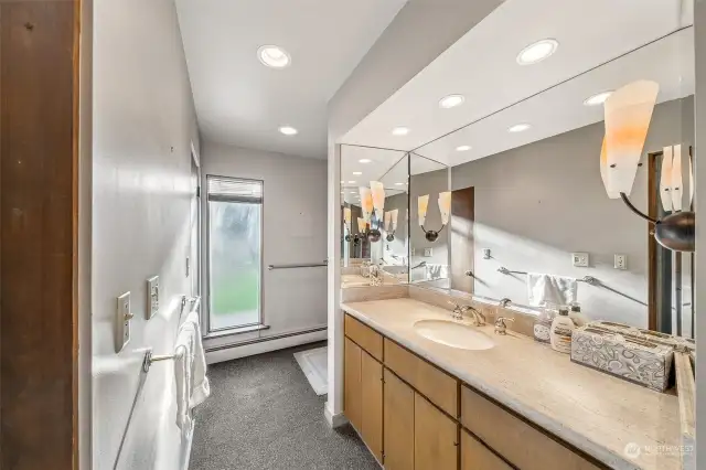 This 3/4 bathroom is located on the main level with easy access from the beach.