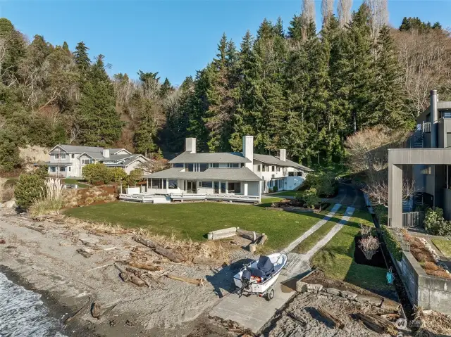 Whether you love boating with your own personal boat launch, paddleboarding, or simply soaking in the serenity, this home is a rare find in an unbeatable location.