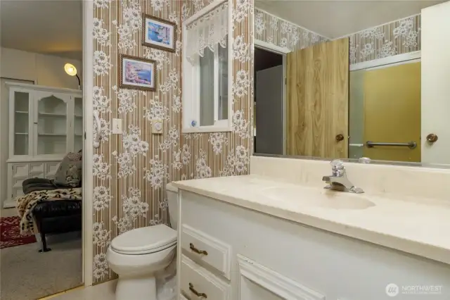 Full Bath adjacent to Bedroom 2 and Laundry Room/Entry