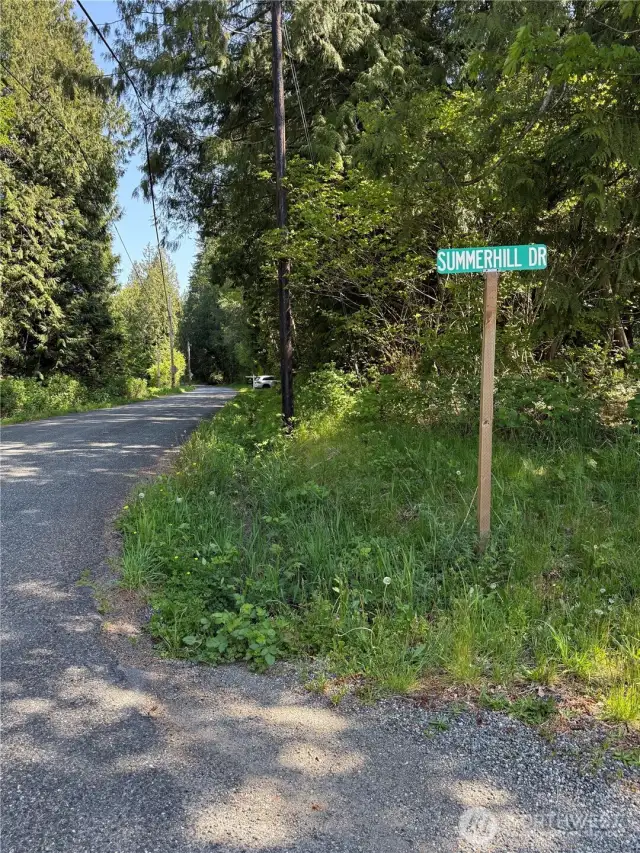Entrance is just past Summerhill Dr. Also Southwest boundary marker is just to the left of this sign