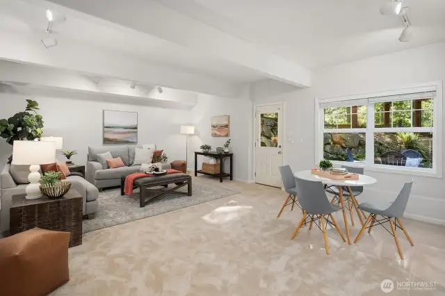 Huge bonus room on the lower level with it's own fenced yard and patio.