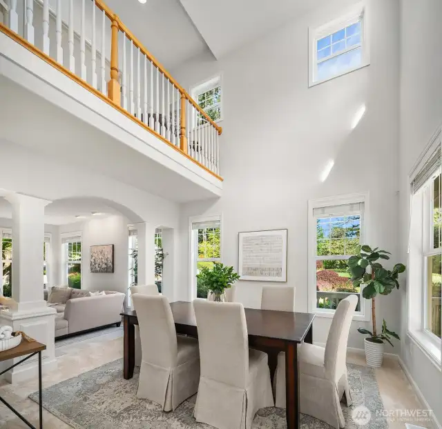 Gorgeous dining room with vaulted ceiling.