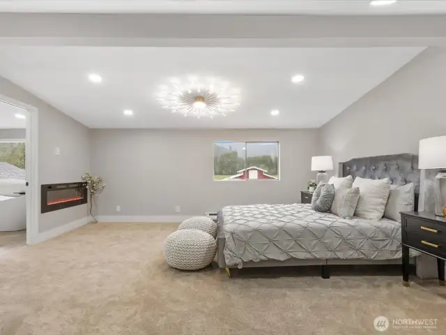 cozy electric fireplace in primary!