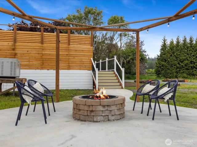 poured concrete firepit area just off back deck