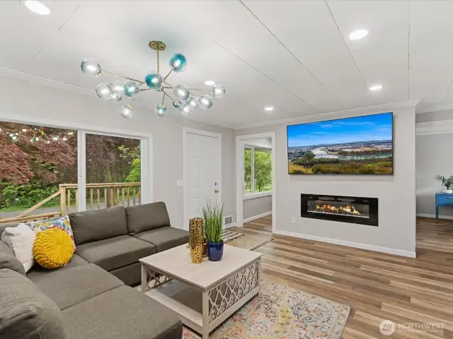 enter right into the smaller living space with electric fireplace - TV can stay!