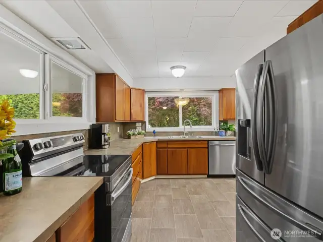 large farm-style kitchen with TONS of cabinet space