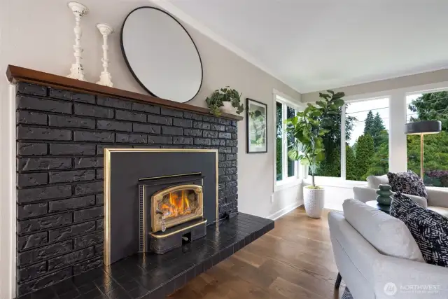 Wood burning fireplace makes the living room extra cozy.