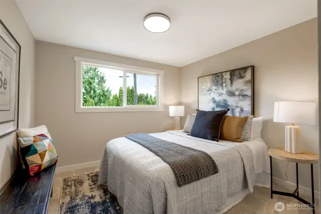 Another main floor bedroom with closet.