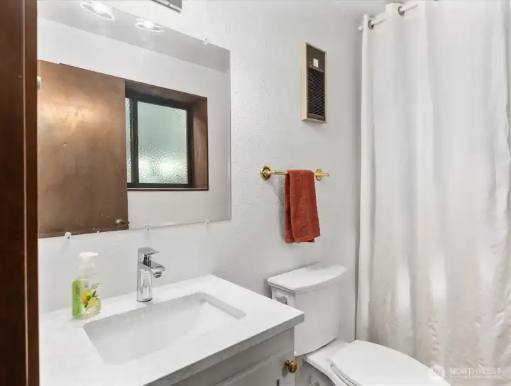 Lower 1/2 bath, plumbed for a shower