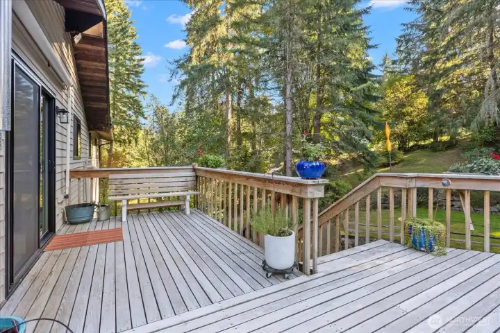deck with stair access to back yard