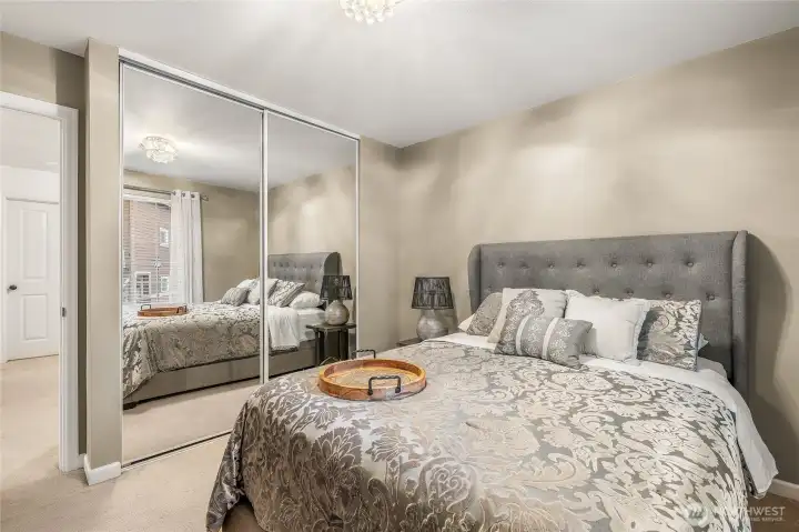 Secondary bedroom with generous closet and natural light