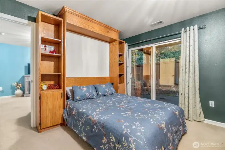 Lower living space featuring built-in Murphy bed for versatility