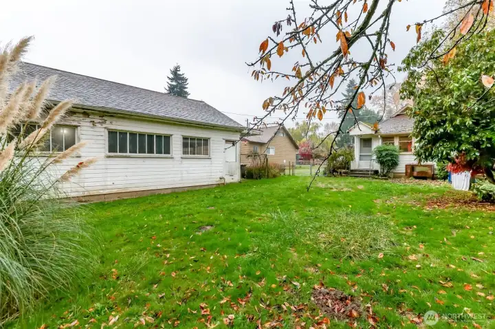 Garage and house from backyard