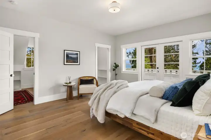 Primary bedroom with 2 walk in closets