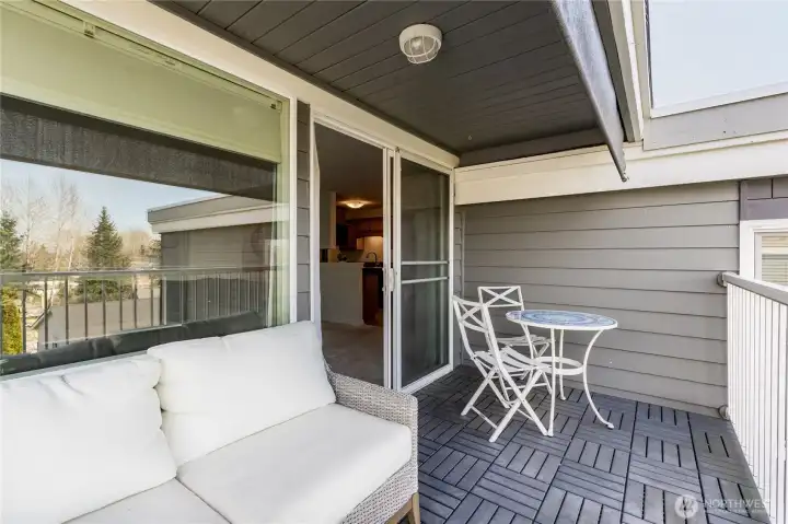 An ideal outdoor sanctuary for morning coffee or evening cocktails