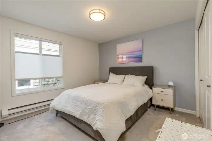 The primary suite features versatile top-down/bottom-up shades to perfectly balance light and privacy