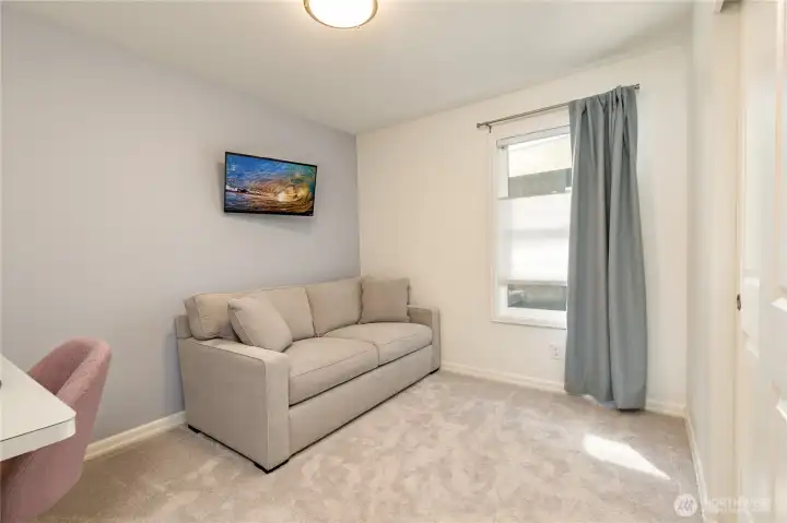 A spacious second bedroom; ideal for guests, home office, or creative studio.