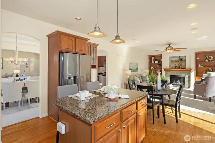 Open, bright, and connected — the kitchen, dining, and family room flow together beautifully.