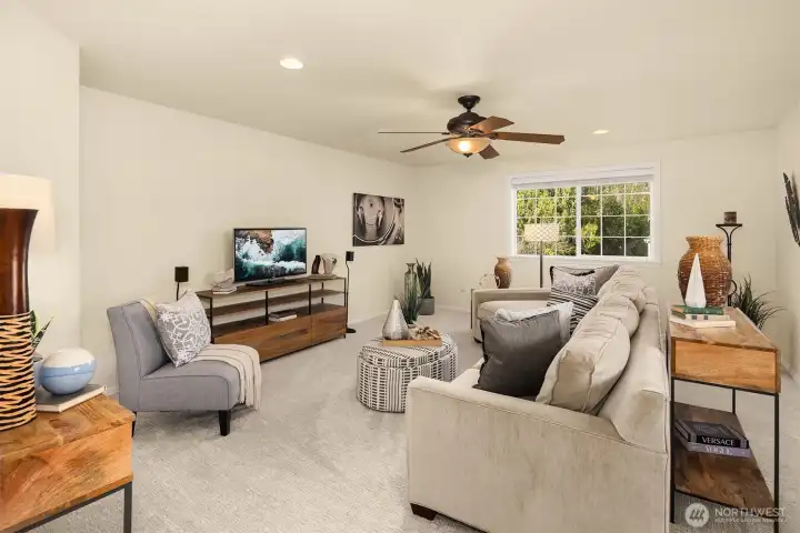 The large upstairs bonus room is as versatile as it is spacious — and with a closet, it easily doubles as a fifth bedroom.