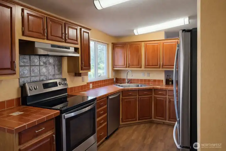 Cozy Kitchen with Stainless Steel Accents