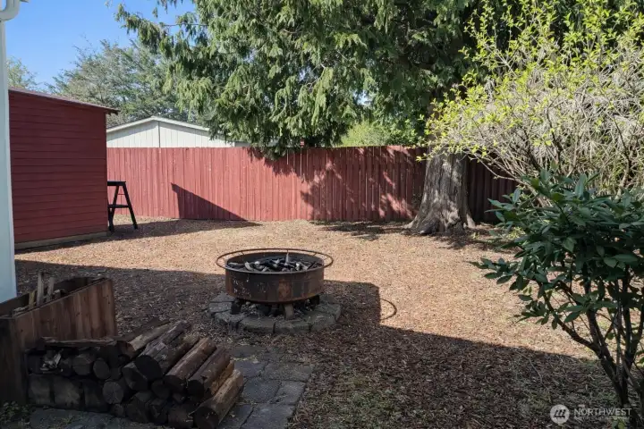 Secluded backyard with fire pit