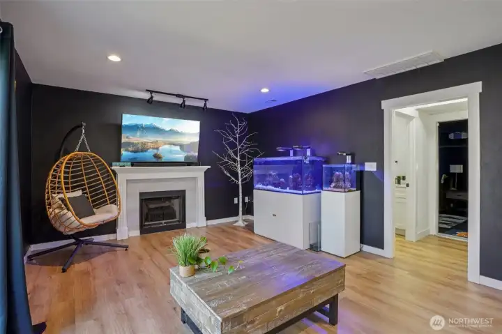 Lower level family/living room with entrance to outside patio