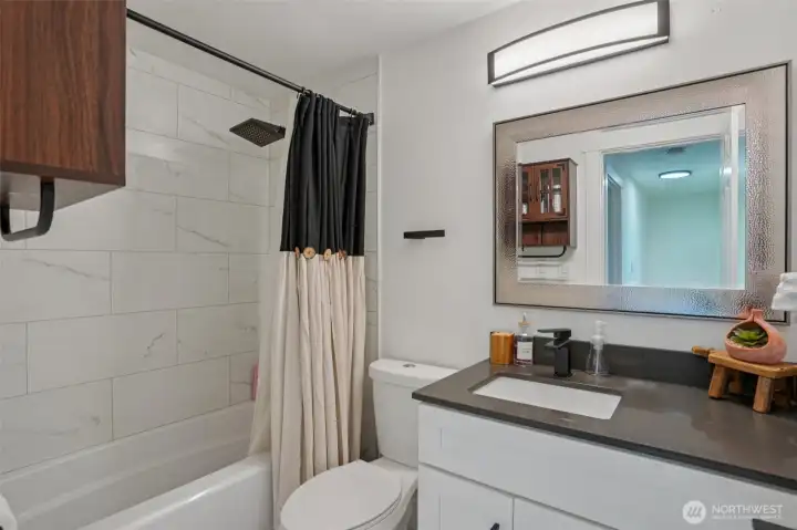 One of two full bathrooms upstairs