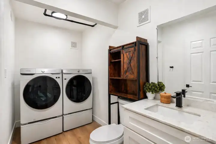 Laundry and powder room downstairs