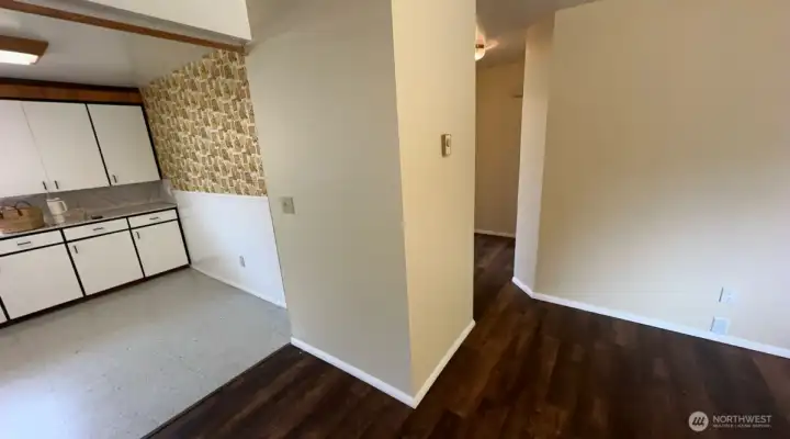 Unit 523: Here is the view of the kitchen and hallway leading to the bathroom and bedrooms.