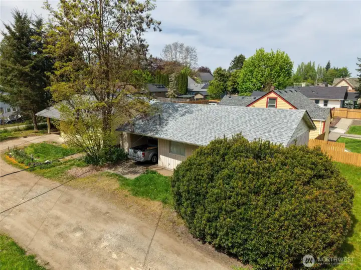 Unit 521 is 839 sq. ft., built in 1965 and is to the right and the carport is on the left. This home does need some TLC and is currently rented well below market on a month to month term for $787.50.